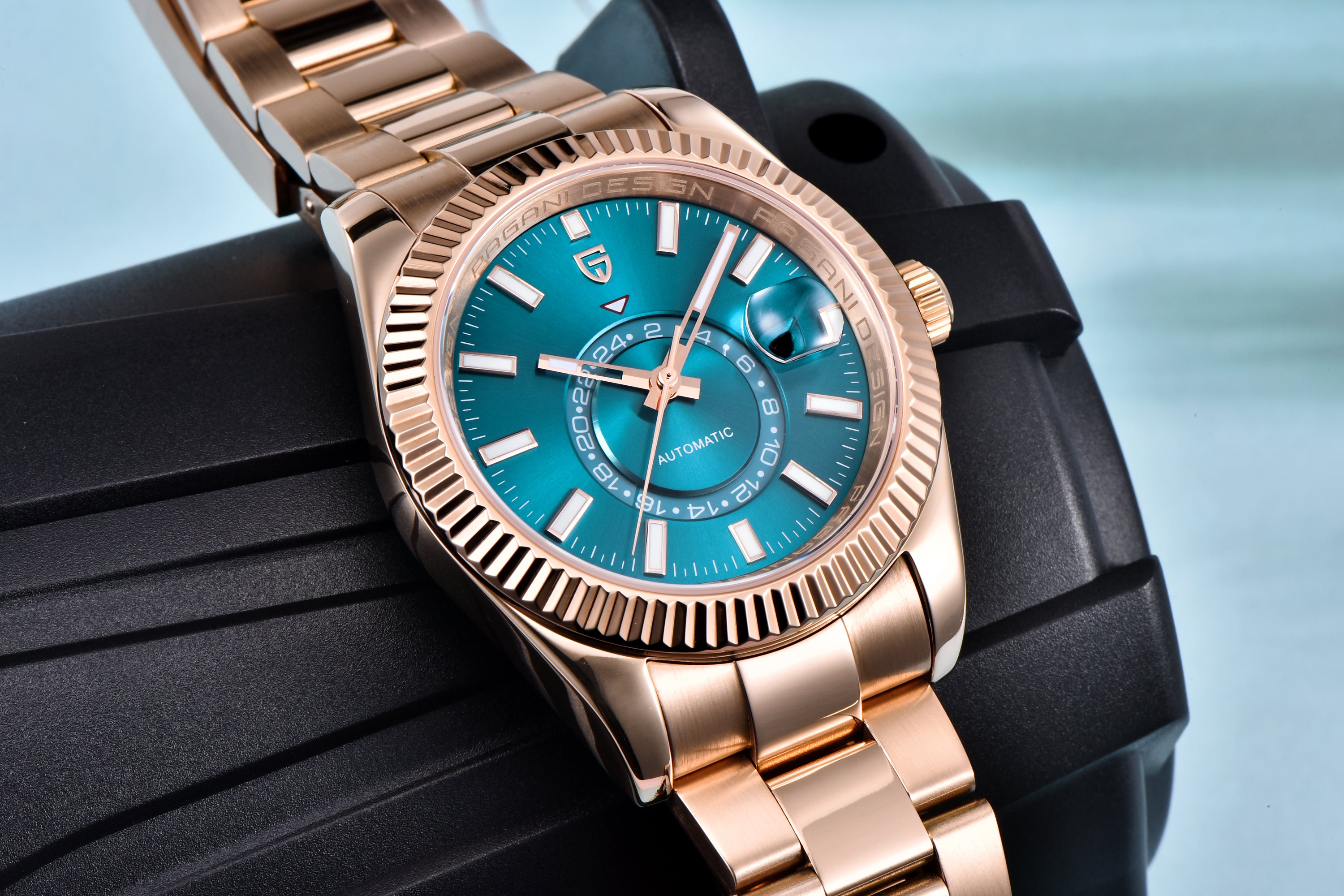 Pagani Design PD-1888 rose gold automatic watch with turquoise dial, close-up on black display stand