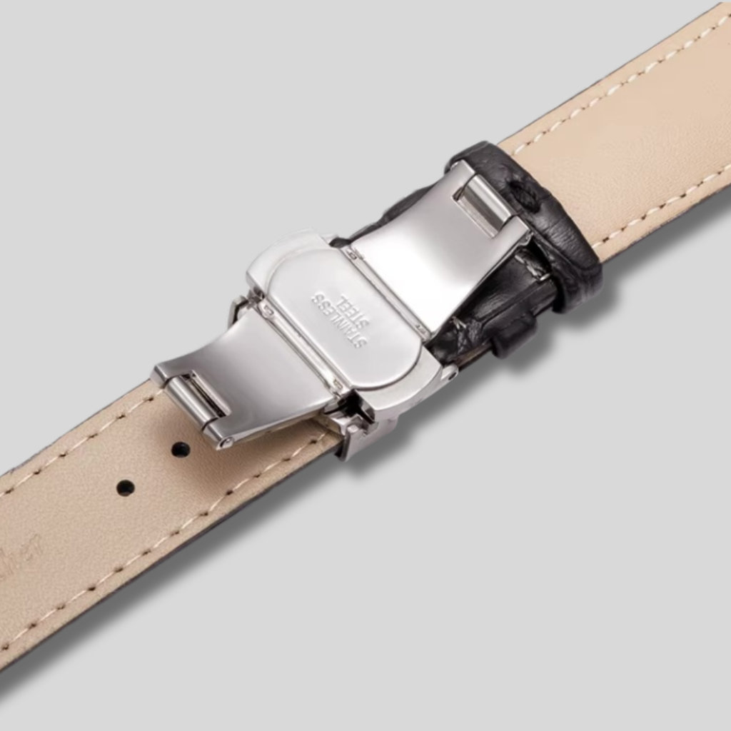 Close-up of a watch strap with a silver buckle